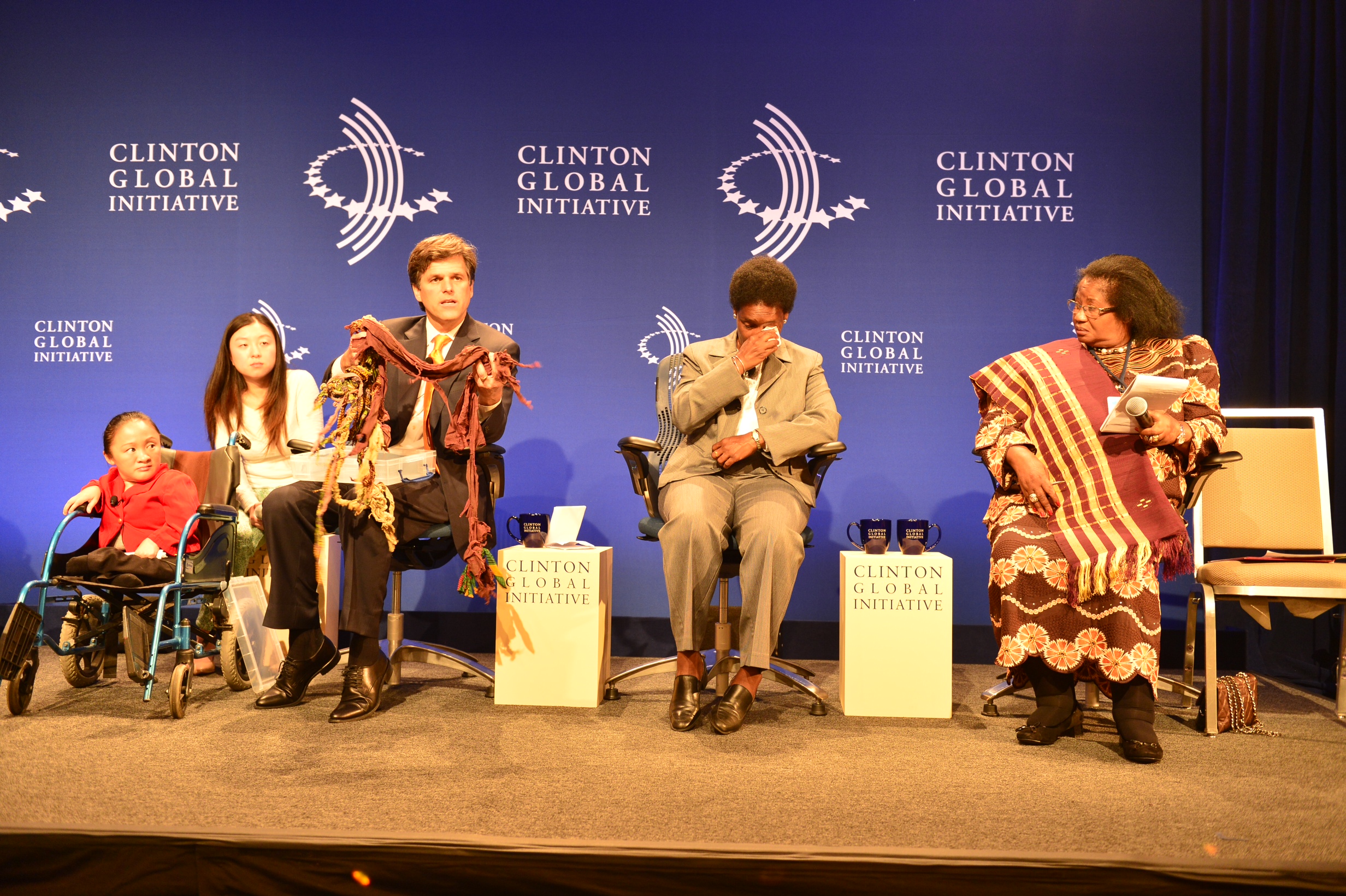 n emotional moment at today's Clinton Global Initiative forum on "From Stigma to Success: Empowering The World's Billion People with Disabilities." From left, Special Olympics Chairman and CEO Tim Shriver, Special Olympics athlete Loretta Claiborne and Her Excellency President Joyce Banda of the Republic of Malawi. Shriver is holding the rope that served as a leash - for 7 years - keeping a young boy with intellectual disabilities tied to a tree.